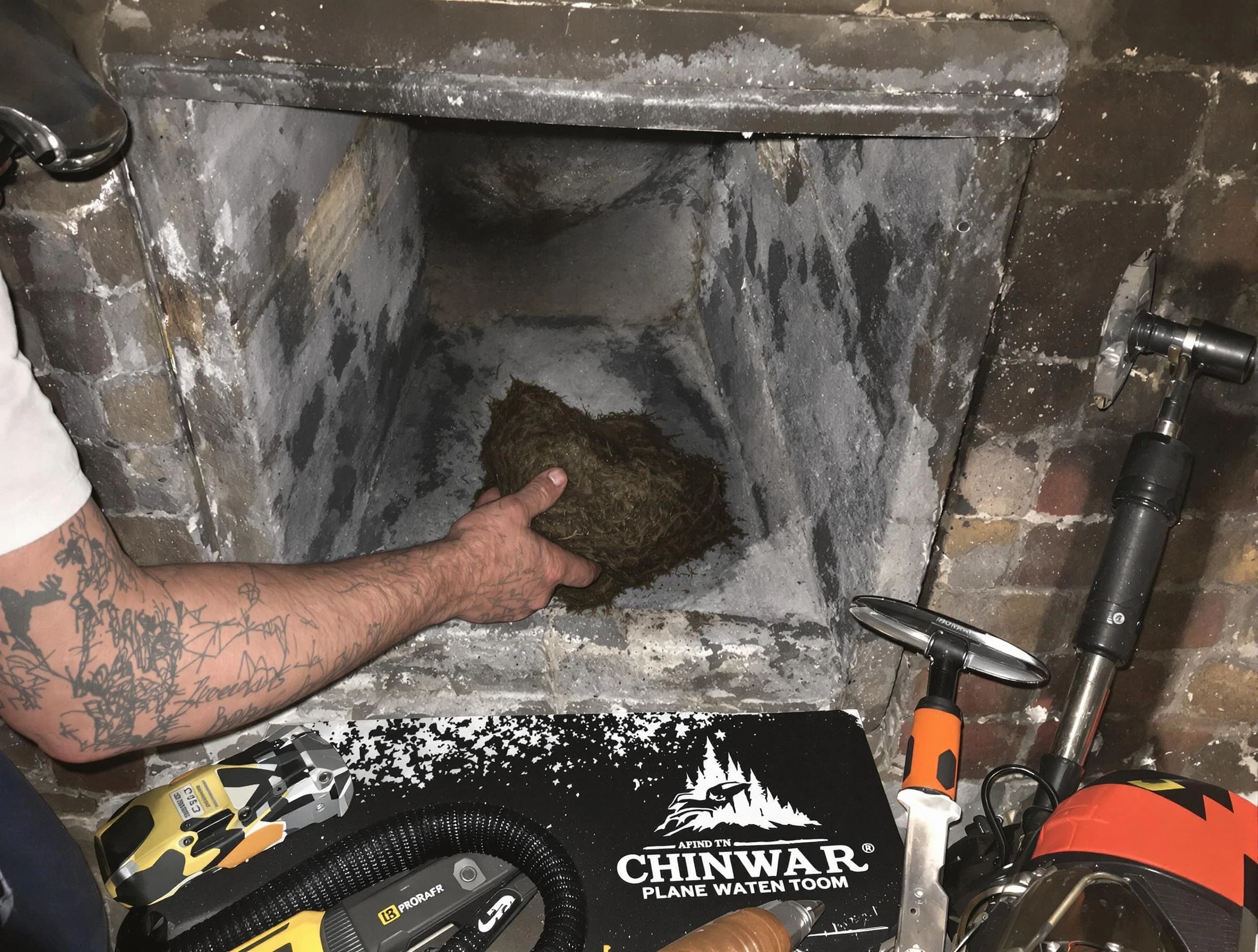 North Fayette Chimney Sweep safely removing debris and screening chimney in North Fayette, PA